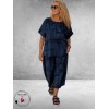 Frenzi Broekpak Jeanslook/Krantenprint