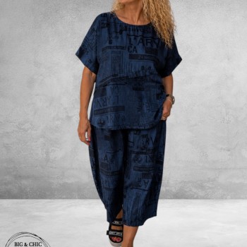 Frenzi Broekpak Jeanslook/Krantenprint