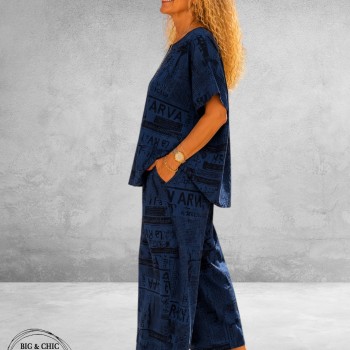 Frenzi Broekpak Jeanslook/Krantenprint