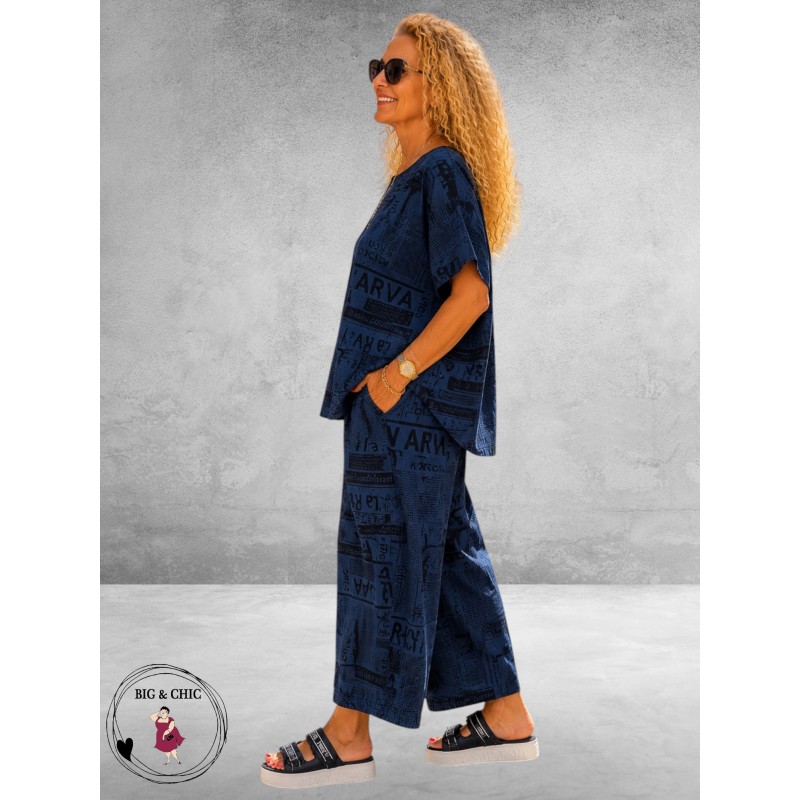 Frenzi Broekpak Jeanslook/Krantenprint