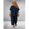 Frenzi Broekpak Jeanslook/Krantenprint